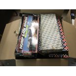 A large collection of Scalextric track, boxed and