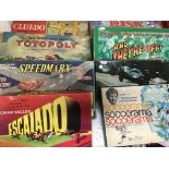 A collection of boxed board games including Cluedo