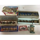 A collection of boxed figures including Johillco B