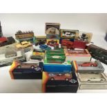 A collection of boxed Diecast vehicles including v