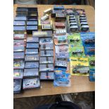 A collection of boxed diecast vehicles including 1