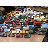 A collection of playworn diecast vehicles includin