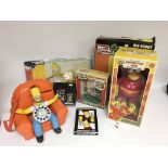 A collection of Simpsons toys etc.