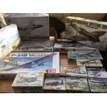 A collection of boxed unused plastic model kits of