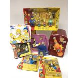 A box containing Simpson’s tv show items, includin