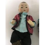 Two Armand Marseille Chinese character dolls in tr