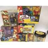 A collection of Simpsons toys figures etc.(7)