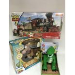 A Toy Story train set,Talking Rex and a Bullseye a