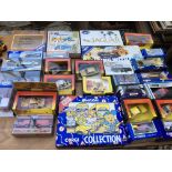 A collection of boxed diecast vehicles including C