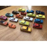 A collection of loose diecast vehicles including C