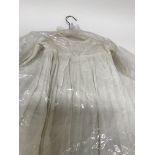 A collection of Edwardian and latter Christening gowns .