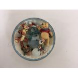 6 Winnie the Pooh collectors plates.