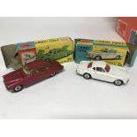 A corgi 238 jaguar mark x boxed together with the saints car Volvo 258 transfer missing.