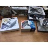 A collection of boxed diecast aircraft including C