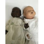 Two German dolls in gowns 36 cm and 42 cm .