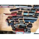 A box containing a collection of OO gauge railway,