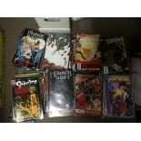A box of assorted comics.