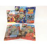 A collection of Toy Story action figures.(5)