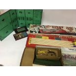 A collection of Vintage racing games Including Mer