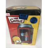 A Simpsons mini cooler, boxed.