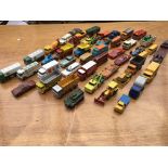 A collection of die cast playworn vehicles includi