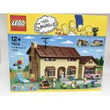 A Lego Simpsons house complete and boxed