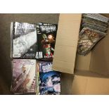 A box of various comics.