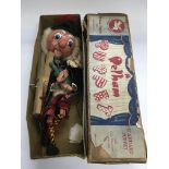 A boxed Pelham puppet.