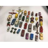 A collection of playworn dinky and matchbox cars.