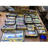 A collection of boxed diecast vehicles including C