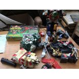 Power Rangers, a box of figures and spare parts