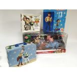 A Toy Story figure playset, board game, play suit