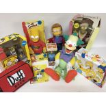 A collection of Simpsons toys etc.(10)