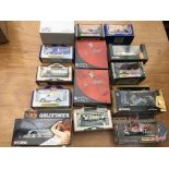 A collection of boxed diecast vehicles including C