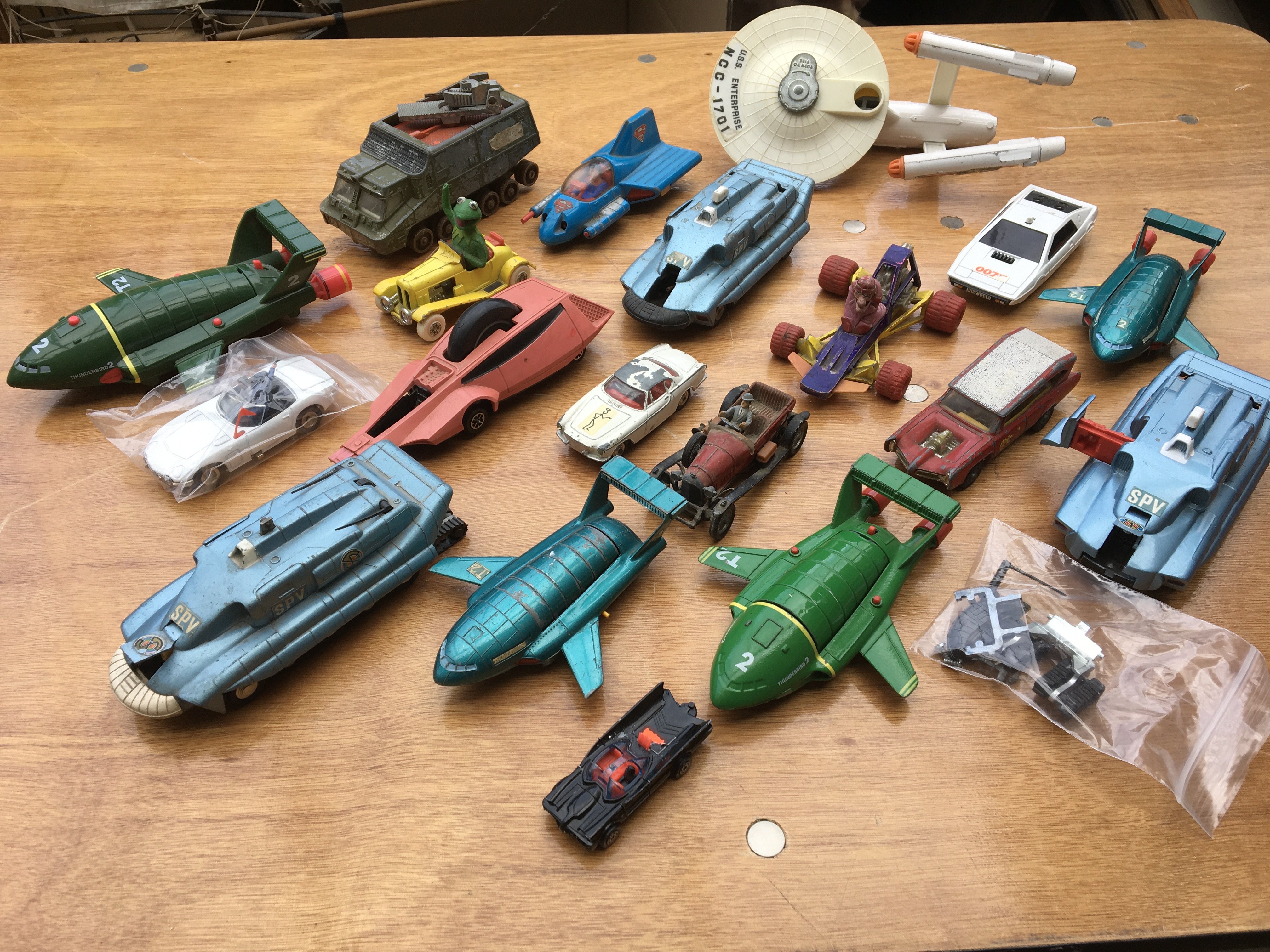 A collection of playworn TV related diecast vehicl