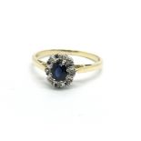 An 18ct gold sapphire and diamond cluster ring, ap