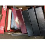 A collection of cigarette card empty albums, plastic leaves ( various sizes ) dividers etc