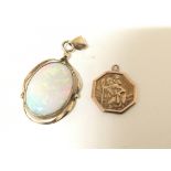 A 9carat gold St Christopher and a 9ct gold pendent set with an opal. Weight 4.5g