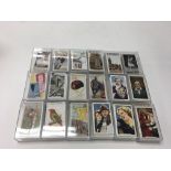 A collection of 35 sets of cigarette cards including Churchmans “ Lawn Tennis “ ,Lambert &