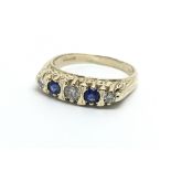 A 9ct gold sapphire and diamond ring, approx 2.9g