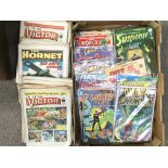 A box containing a collection of sci-fi comics including Challengers of The Unknown, Ghostly