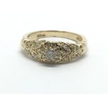 A 14ct gold diamond cluster ring, approx 3.9g and