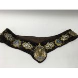 Vintage “Royal order of Buffalos” hanging neck collar with seventeen gilt and enamel badges and gilt