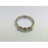 An 18ct gold three stone diamond ring, approx 1ct, approx 7.3g and approx size P.