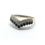 A 9ct gold sapphire and diamond wishbone ring, app