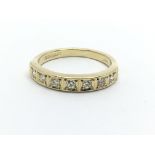 An 18ct gold seven stone diamond ring, approx.33ct