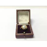 An 18carat gold ring set with a good size pearl. R