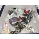 A box of sterling silver pendants, silver marcasite watch brooch and two silver stick pins.