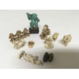 A collection of small late 19th century ivory carvings and two Japanese beads and a carved turquoise