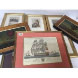 A collection of framed prints and pictures includi